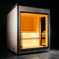 Sauna |   Cabane de luxe moderne minimaliste panoramique en bois gris avec cadre noir pour l'extérieur