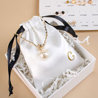 Pochette de rangement pour bijoux en satin de luxe personnalisée avec cordon de serrage et logo imprimé pour collier, bague, boucles d'oreilles