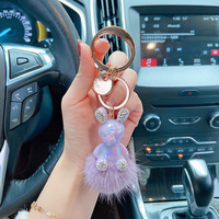 Vente en gros porte-clés lapin coloré pompon pneu électrolytique porte-clés lapin sacs à main breloques porte-clés voiture
