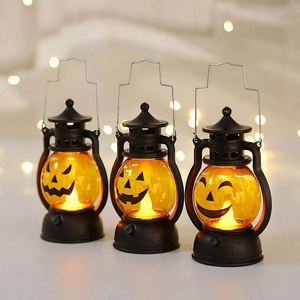 New Design Halloween Hand-held Pumpkin Lamp Small Lantern for bar Party Atmosphere Decoration - Product Image 1