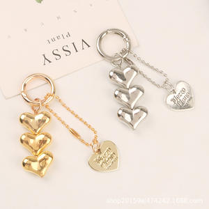 Nuevo colgante de llavero de coche, cadena creativa con cuentas de corazón, funda fresca para auriculares, accesorios para bolsa - Product Image 2