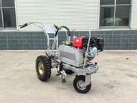 Ceci est une machine à décapage de revêtements par pulvérisation à froid, adaptée aux garages souterrains et aux travaux de construction sur de petites surfaces.