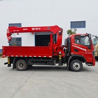 Camion-grue pour zones minières, pour la manutention de minerai, les opérations de levage et le transport sur route dans les mines