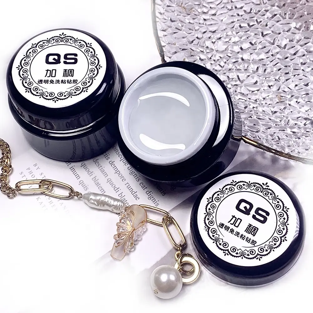 QSHY Logo personalizzato etichetta privata all'ingrosso Nail Art UV LED Soak Off trasparente 3D strass diamante colla Gel Polish