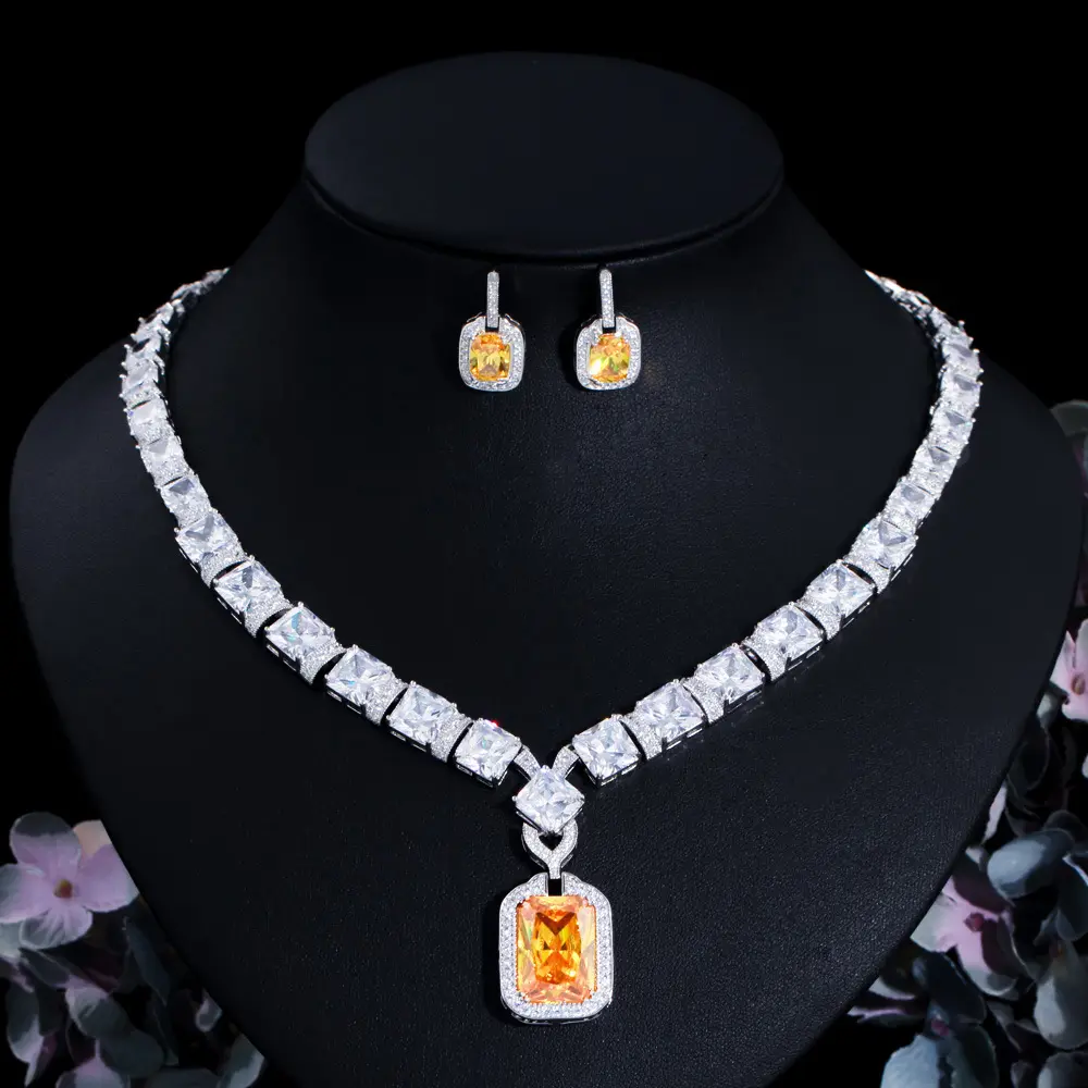 Expensive and beautiful large hanging pendant with yellow cubic zirconia crystal below luxurious bride's wedding jewelry for wo