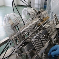Machine de remplissage et de scellage d'ampoules