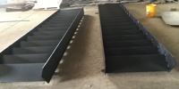 Escaliers extérieurs en acier finition noire, marches de jardin