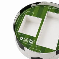 Boîte cadeau rigide en forme de ballon de football personnalisée avec compartiments pour les ensembles cadeaux des fans de sport et l'emballage promotionnel