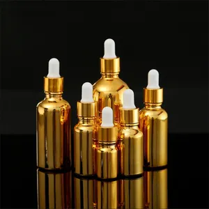 Groothandel Etherische Olie Goud Lege Pomp Dropper Fles 10 Ml /20 Ml Body Olie Glazen Fles Verpakking Met Schroefdeksel