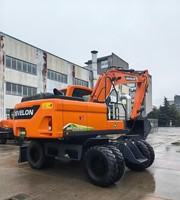 Nouvelle pelle sur pneus de 13 tonnes de marque chinoise DX150WE avec grappin à bois, marteau hydraulique, moteur et pompe à vendre