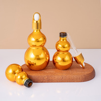Flacons compte-gouttes en verre plaqué or pour huiles essentielles et sérums capillaires, en gros, capacités de 10 ml à 100 ml, avec emballage de vente au détail.