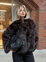 Manteau d'hiver élégant pour femme en fausse fourrure avec col à revers et manches longues