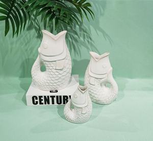 <span class=keywords><strong>Pichet</strong></span> de style moderne en gros de qualité Guggle <span class=keywords><strong>Vase</strong></span> en forme de poisson en porcelaine en céramique pour pot de table à la maison - Product Image 1