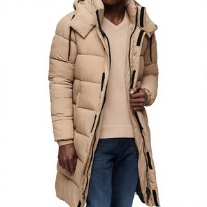 Abrigo acolchado tipo longline en un tono beige o marrón neutro, similar a los diseños del tipo Ripstop Coat. - Product Image 1
