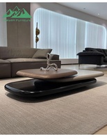 Une table basse luxueuse de style nordique à trois niveaux avec fonction rotative, idéale pour le salon.