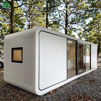 Maison préfabriquée en conteneur en acier contemporain Apple Capsule, structure en acier robuste, panneaux sandwich durables, design écologique pour