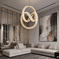 Lustre moderne de luxe en cristal doré avec anneaux entrelacés, luminaire suspendu LED pour escalier et salle à manger
