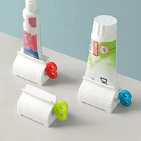 Nouvel accessoire de salle de bain : Distributeur de dentifrice et presse-tube pour nettoyant facial
