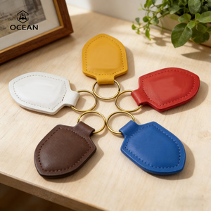 Porte-clés circulaire en cuir avec anneau, mini sac à bandoulière en cuir, petit sacoche assorti pour la mode quotidienne - Product Image 1