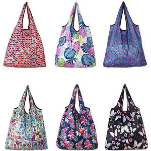 Bolsas de compras de nailon y poliéster plegables reutilizables con logotipo personalizado al por mayor de fábrica de Vietnam respetuosas con el medio ambiente - Product Image 1