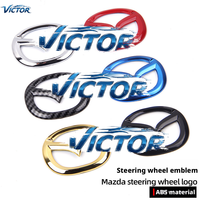 Berlaku untuk Kendaraan Mazda CX-4, CX-5, dan Attiz dengan Stiker Logo Setir Kustom dan Dekorasi Penutup.