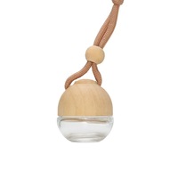 Mini diffuseur de parfum pour voiture rond suspendu en verre avec bouchon en bois et logo laser