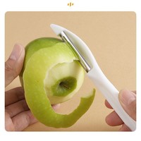 Nieuw model roestvrijstalen schilmesje voor het snijden van fruit en groenten. Fruit- en groenteschiller voor thuisgebruik met creatief ontwerp.