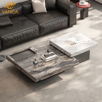 Table basse en marbre naturel de luxe léger, design carré flottant moderne, sensation haut de gamme pour hôtel et salon