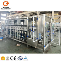 Ligne de production d'eau automatique 120-1200 BPH à haute vitesse avec système de décapsulage et de remplissage de bouteilles de 5 gallons (18,9 L) à économie d'énergie