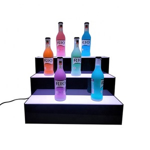 Soporte de exhibición de acrílico con luz LED de 3 niveles personalizado para botellas de alcohol de vino y licor Soporte de elevadores de vino ecológico de moda - Product Image 1