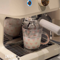 500ml schattige patroon glazen koffiemok van borosilicaatglas met glitterhandvat, Ins-stijl, hittebestendig glazen beker voor latte en ijskoffie