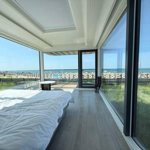 Cabines modulaires préfabriquées portables, structures en acier galvanisé écologiques, alimentées à l'énergie solaire, résistantes à l'eau, pour resorts et villas - Product Image 2