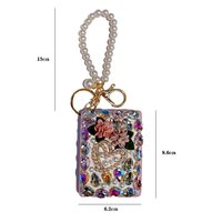 Miroir de maquillage compact en forme de cœur avec strass et perles, porte-clés, breloque de sac à main pour femmes, idéal pour les cadeaux (vente en gros)