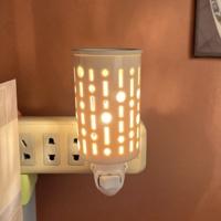 Diffuseur de cire électrique en céramique moderne, motif floral creux, prise américaine, lampe d'aromathérapie pour la maison, parfum d'ambiance et veilleuse