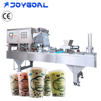 Machine de remplissage et de scellage automatique de gobelets en plastique pour thé au lait Boba et jus, utilisée en usine pour les boissons