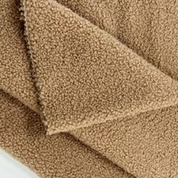 Tissu en velours doux en peluche Teddy 100% tissu polaire en polyester pour manteau d'hiver à la mode ours en peluche
