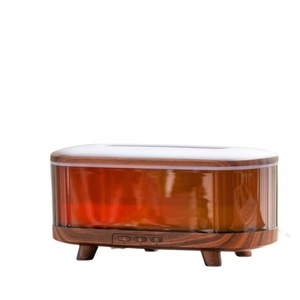 Diffuseur d'huiles essentielles de luxe en forme de capsule volcanique à grain de bois avec grille de respiration chauffante et lampe de nuit - Product Image 1