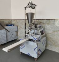 Machine commerciale de fabrication de Baozi de forme ronde, petite machine à Momo, machine à pains à la viande cuits à la vapeur avec moteur intégré