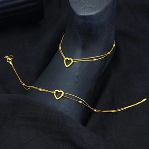 Chaîne de cheville en forme de cœur, bijou de mode élégant, chaîne de cheville délicate, bijou de pied stylé, accessoire cadeau romantique et raffiné - Product Image 1