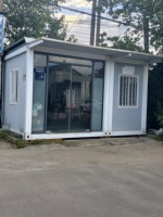 Maison préfabriquée modulaire en acier de 20 pieds/40 pieds, bureau mobile moderne avec mur-rideau en verre