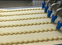 Machine de remplissage multifonctionnelle pour le remplissage intermittent ou continu de produits souples, durs, fibres et crémeux
