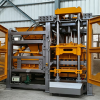 Machine automatique QT4-15 pour la fabrication de blocs de béton, machine à fabriquer des blocs creux pour les petites entreprises et les briqueteries