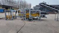 Machine à fabriquer des briques creuses en béton QT4-15 entièrement automatique avec boîte de vitesses hydraulique, haute productivité, 27KW, en vente