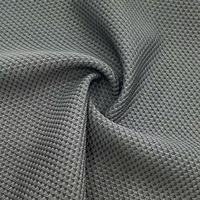 ANONO Lot de surplus de haute qualité Jacquard Polyester Spandex tricoté teint en rouleau pour vêtements de sport Tissus textiles