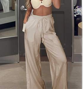 <span class=keywords><strong>Pantaloni</strong></span> da donna in cotone in lino <span class=keywords><strong>a</strong></span> gamba larga <span class=keywords><strong>a</strong></span> metà vita con coulisse elasticizzati Anti-Pilling <span class=keywords><strong>pantaloni</strong></span> della <span class=keywords><strong>tuta</strong></span> estivi Casual tasche - Product Image 4