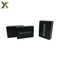 Boîtes en carton personnalisées noires avec couvercle UV, insert en mousse découpé et lamination mate pour emballage d'électronique grand public