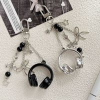 Étui pour écouteurs perlé fait main, design original style pointillisme personnalisé, porte-clés, breloque de téléphone personnalisée, pendentif de sac à dos