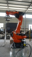 Machine robotique OEM d'ouverture de sacs pour poudres chimiques avec système de collecte des poussières