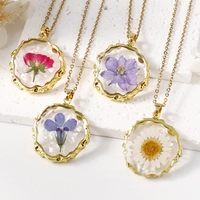 Bijoux de collier en acier inoxydable doré haut de gamme à la mode avec chaîne à maillons vraie fleur et pendentif en résine transparente de fleur séchée