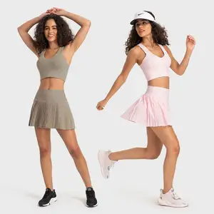 Özel Logo Golft tenis spor Yoga kıyafeti V boyun spor sutyen pilili Mini etek iki parçalı takım elbise seti kadınlar açık tenis giysileri
